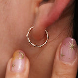 Slim wavy hoop earrings