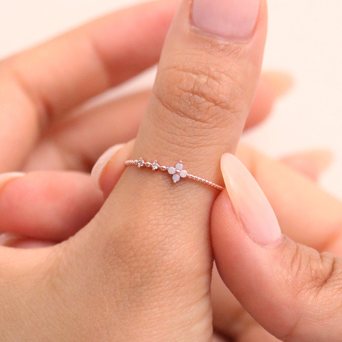 Moonstone Cubic Flower Ring handcrafted with a glowing moonstone centre and delicate cubic flower petals, blending natural beauty.