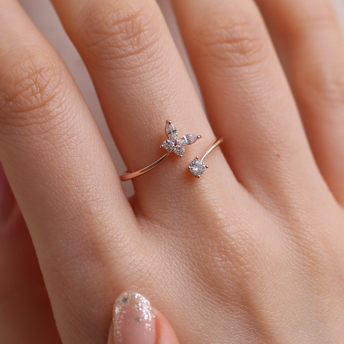 Butterfly cubic ring