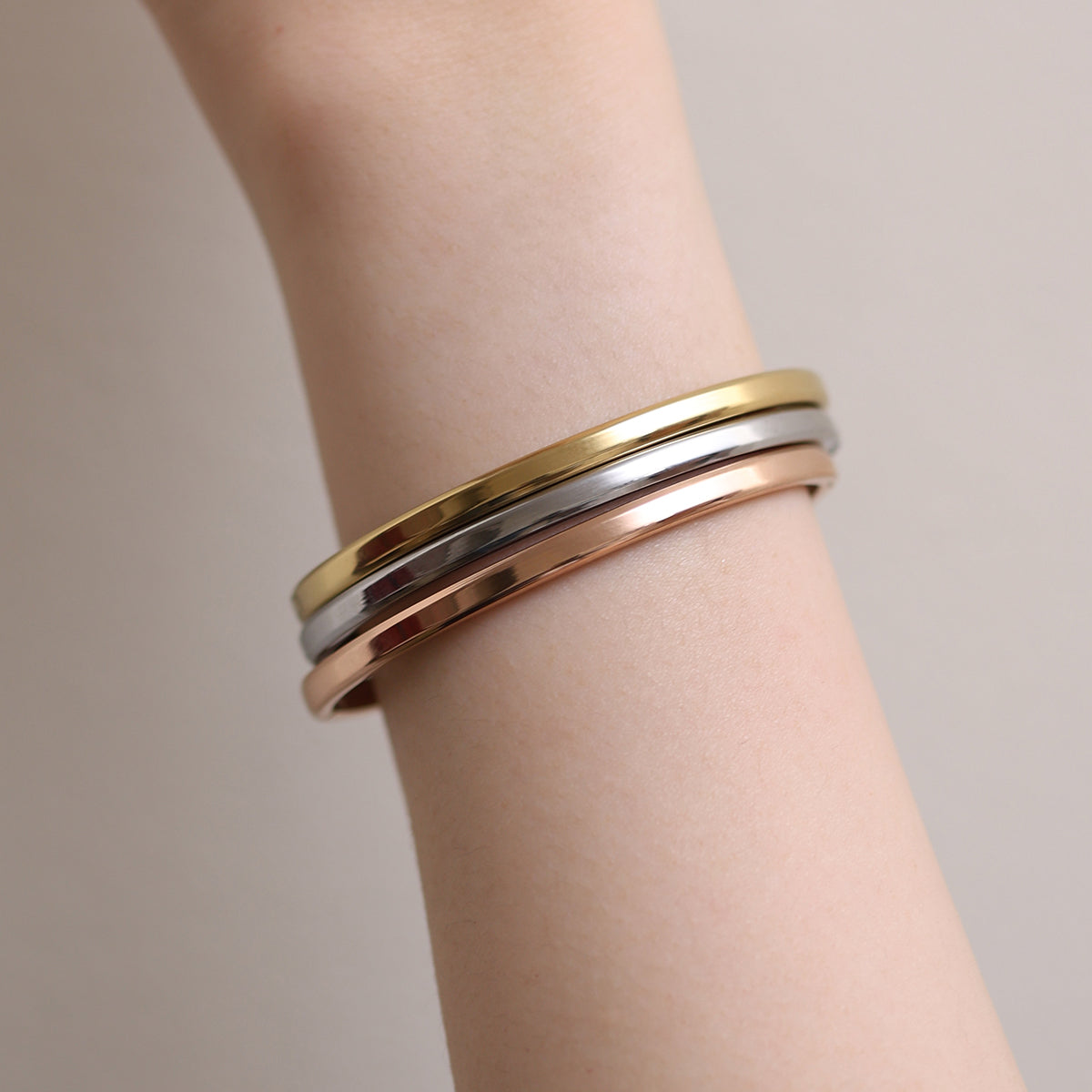 Thin Bangle featuring a precision-crafted, minimalist design with a slender profile, offering versatile style and durable elegance for any occasion.