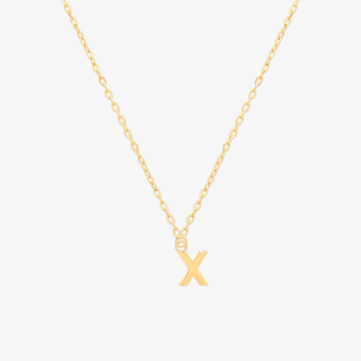 Classic initial pendant necklace featuring a polished letter charm on a delicate chain, showcasing a timeless and elegant design.