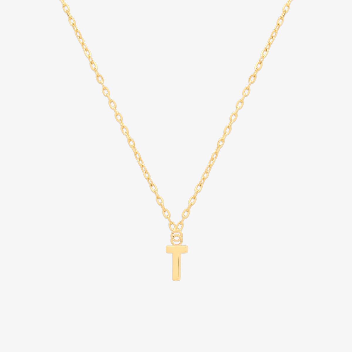 Classic initial pendant necklace featuring a polished letter charm on a delicate chain, showcasing a timeless and elegant design.