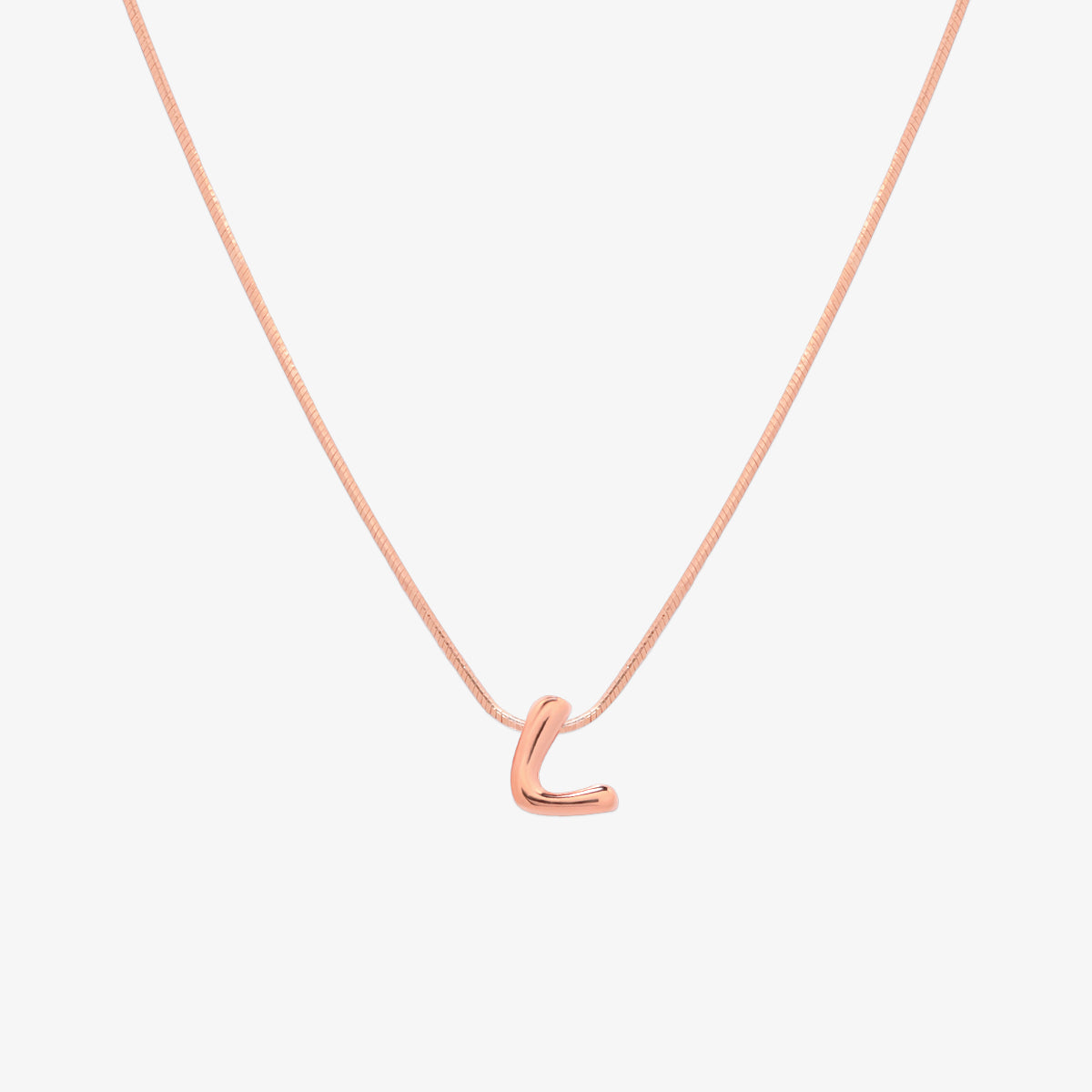 Bubble initial pendant necklace featuring a rounded, playful letter charm on a sleek snake chain, with a smooth and glossy finish.