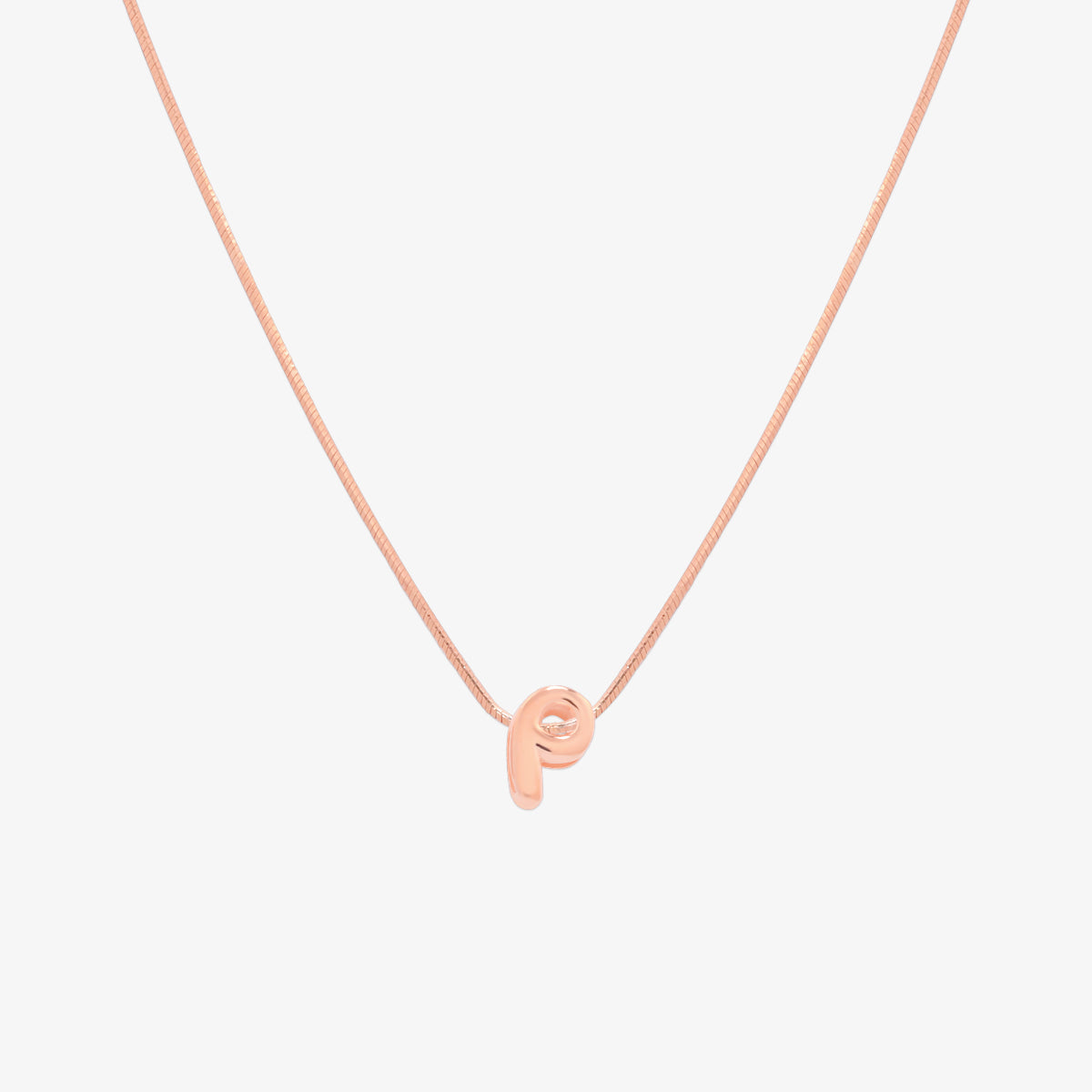 Bubble initial pendant necklace featuring a rounded, playful letter charm on a sleek snake chain, with a smooth and glossy finish.