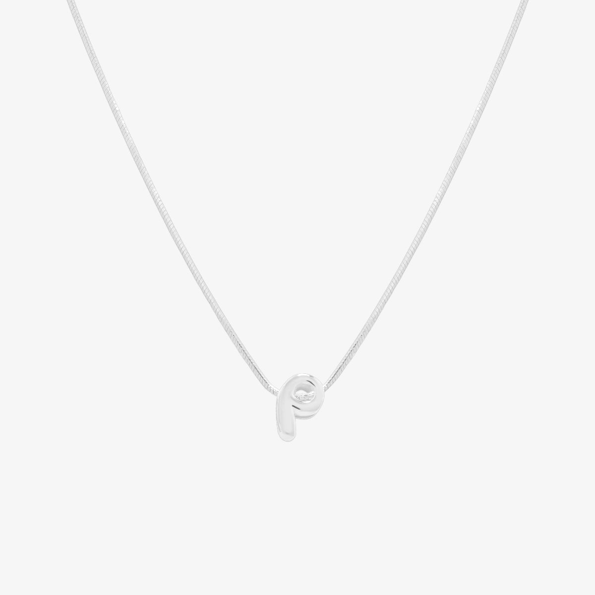 Bubble initial pendant necklace featuring a rounded, playful letter charm on a sleek snake chain, with a smooth and glossy finish.