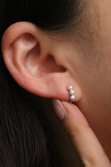 Triple pearls huggie earring