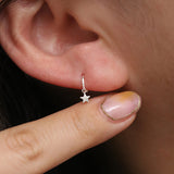 Star charm huggie earring
