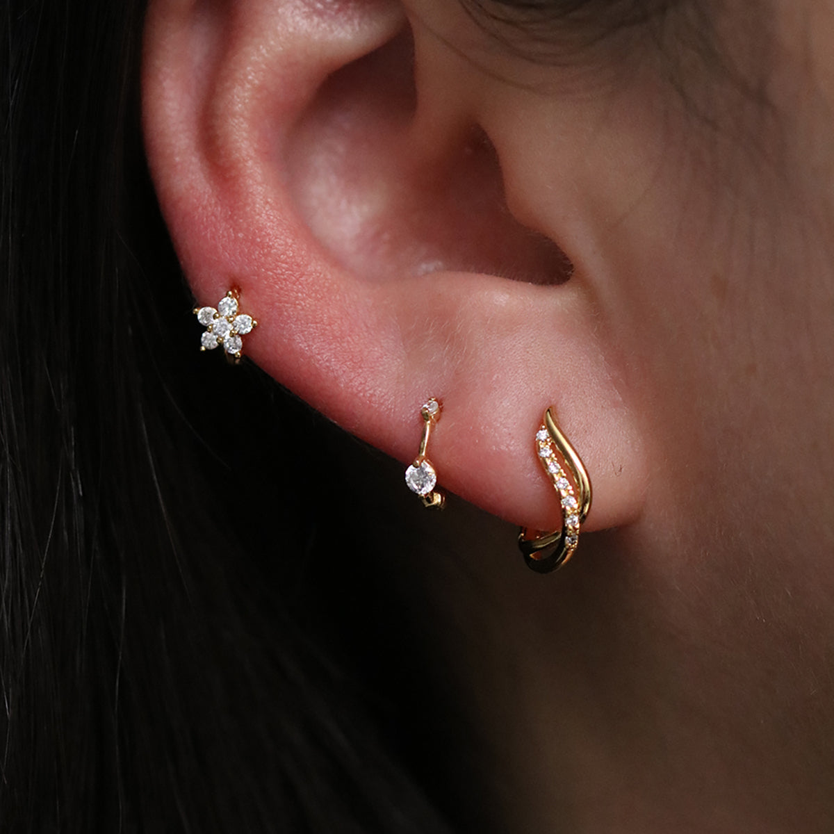 Dainty cubic flower huggie earring