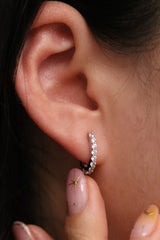 Claw pave huggie earrings