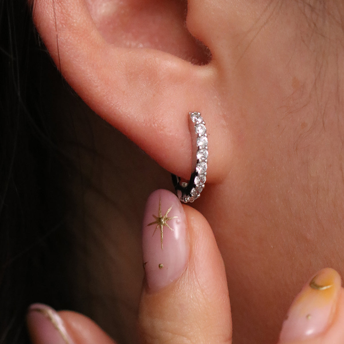 Claw pave huggie earrings