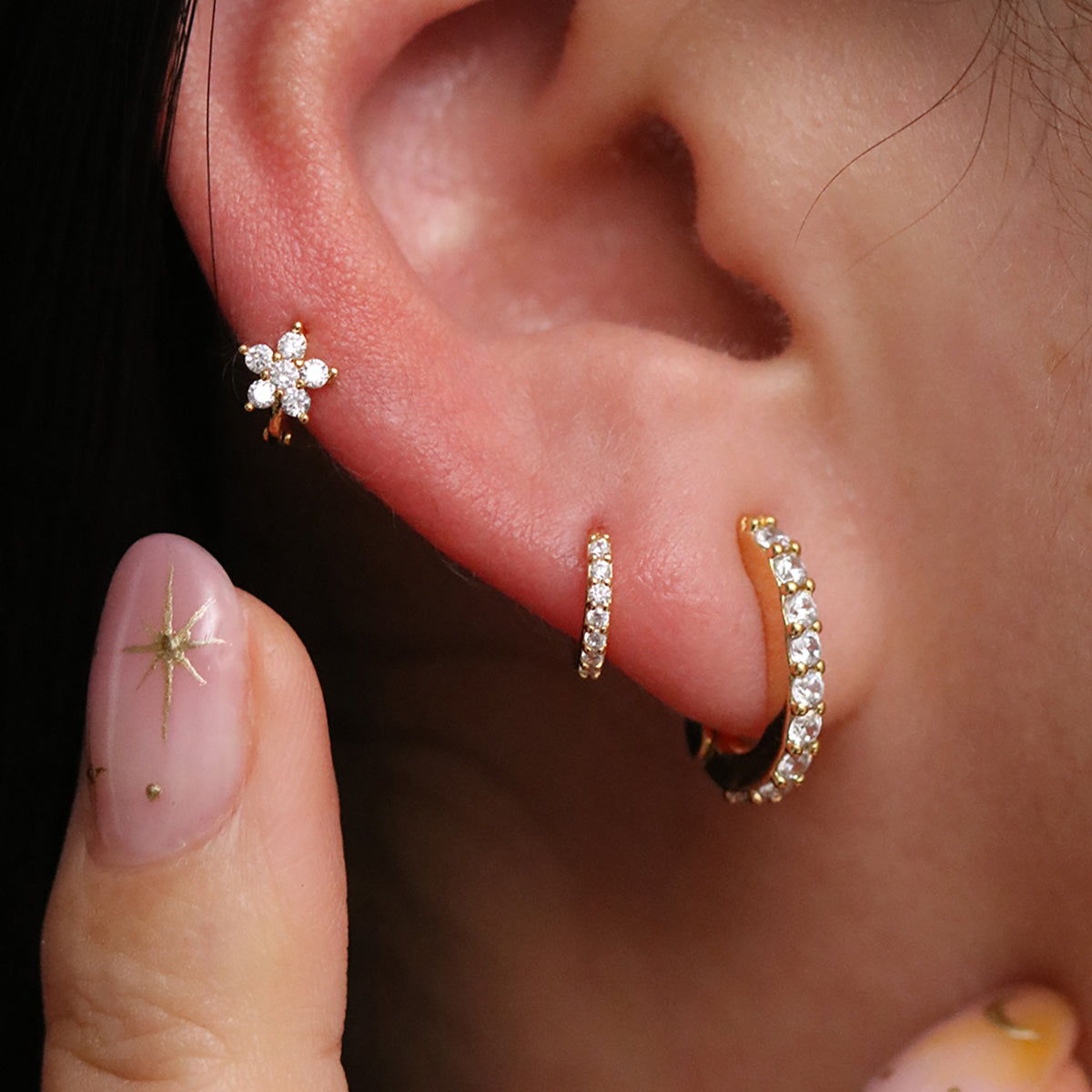 Claw pave huggie earrings