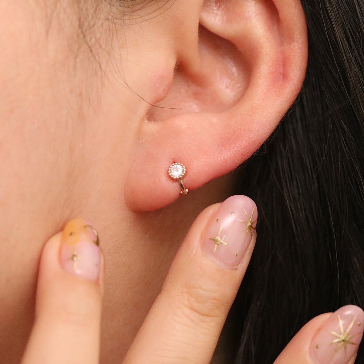 Single cubic huggie earring