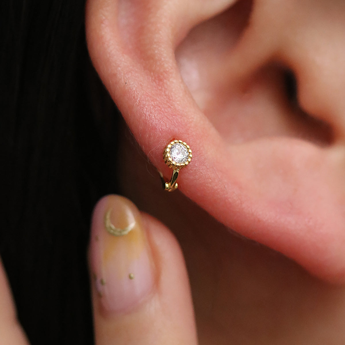 Single cubic huggie earring