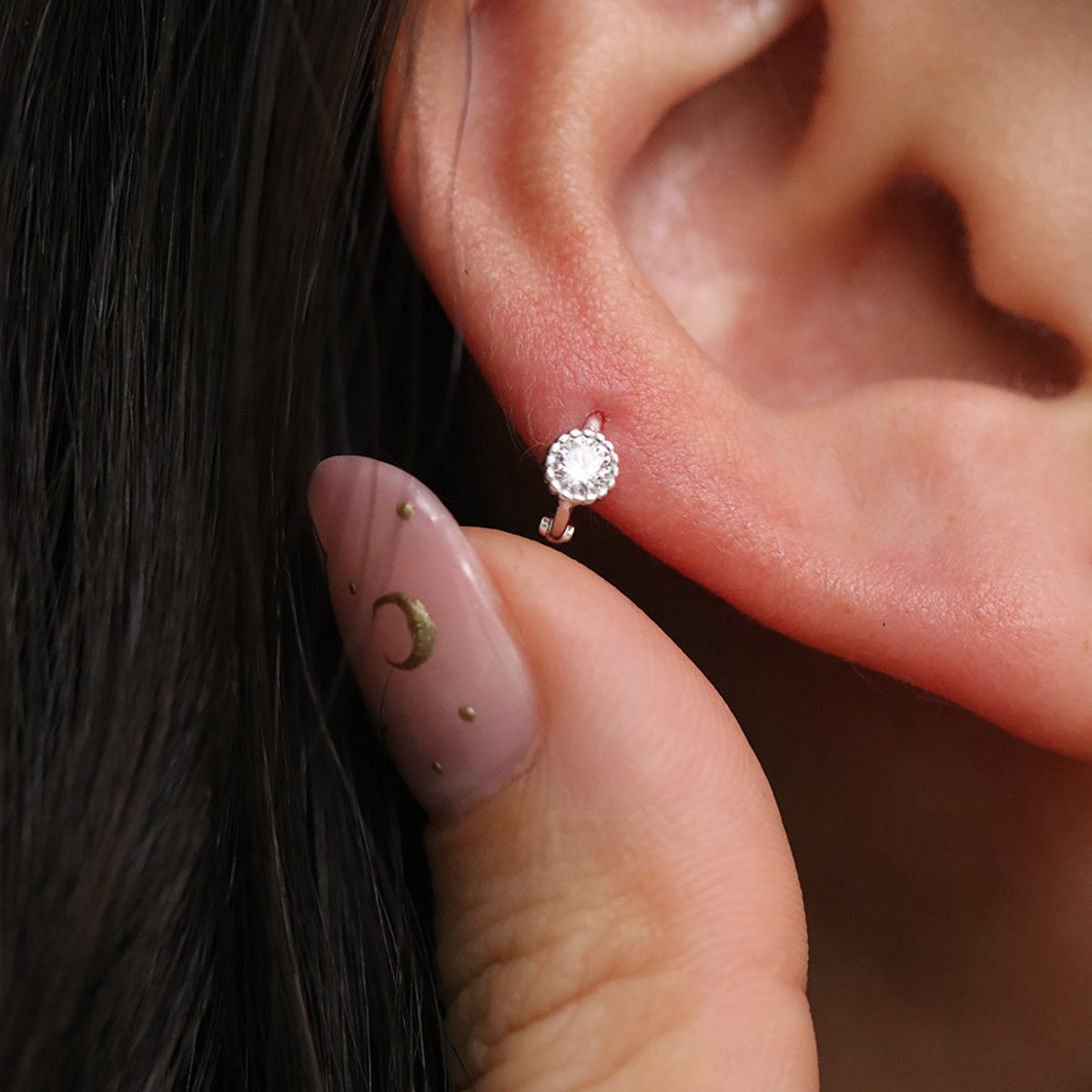 Single cubic huggie earring