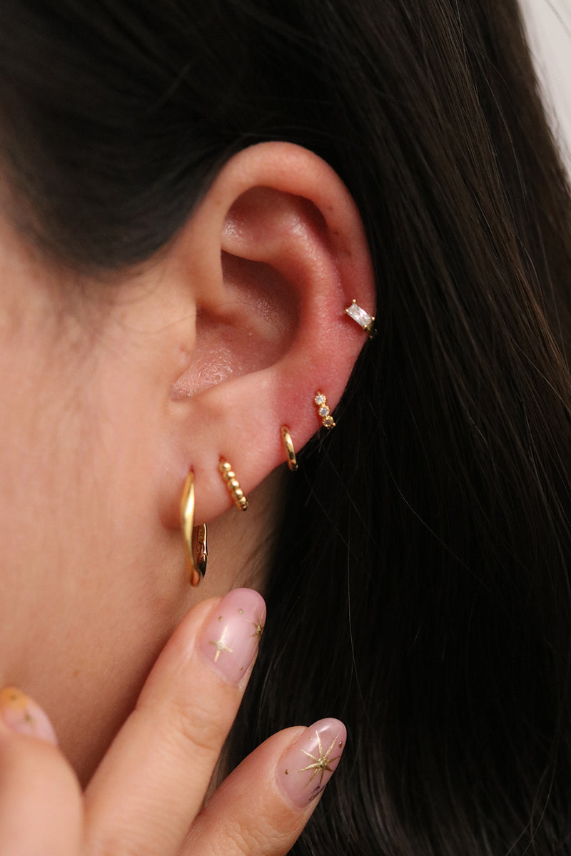 Dotted huggie earring