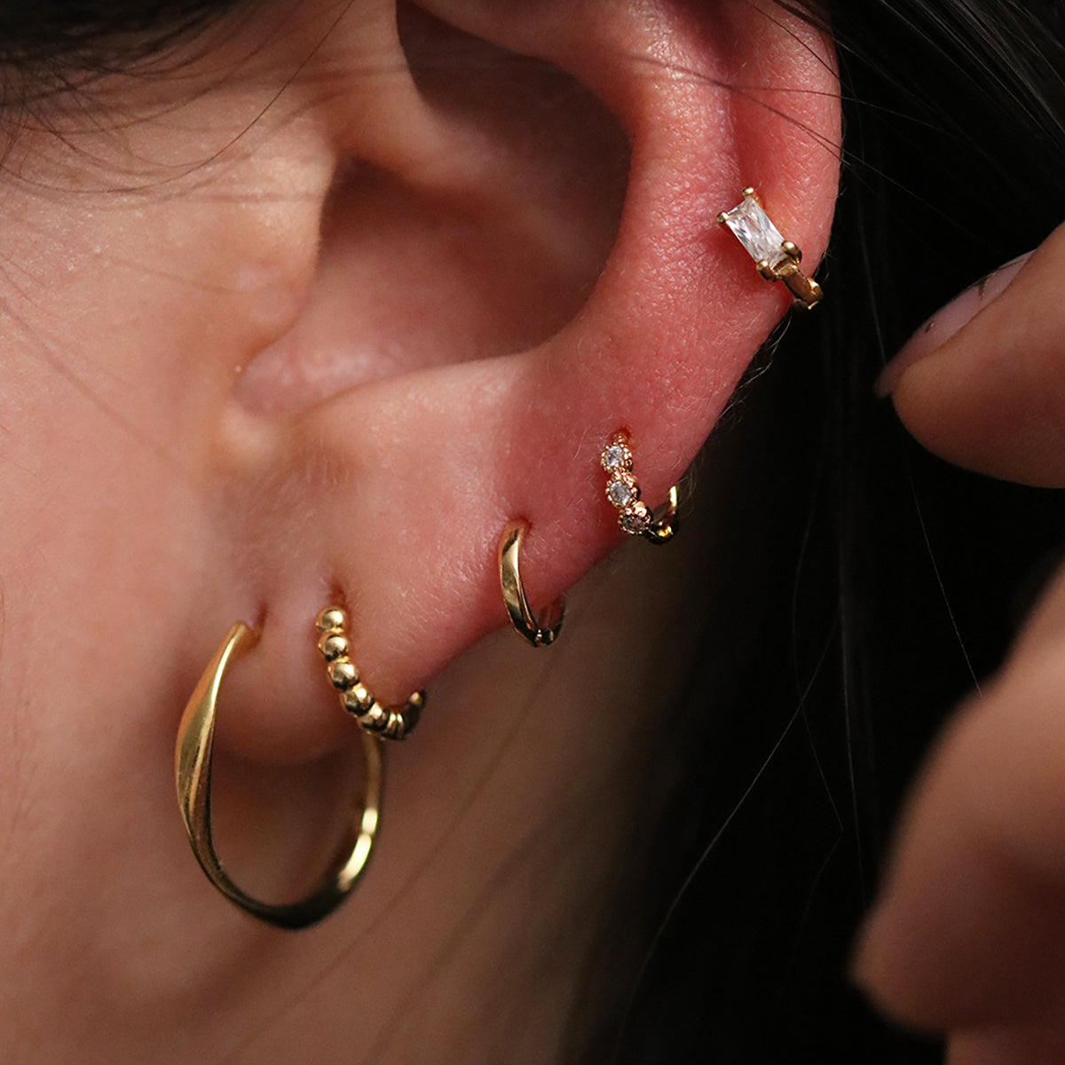 Dotted huggie earring