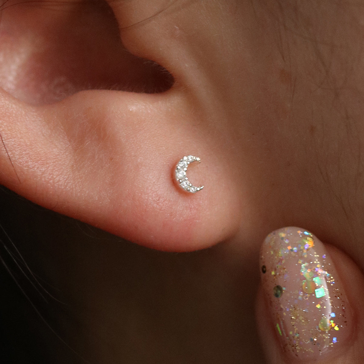 Tiny crystal moon stud earrings