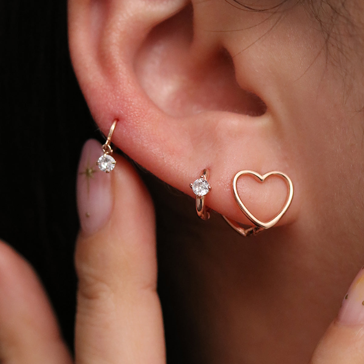 Heart silhouette huggie earrings