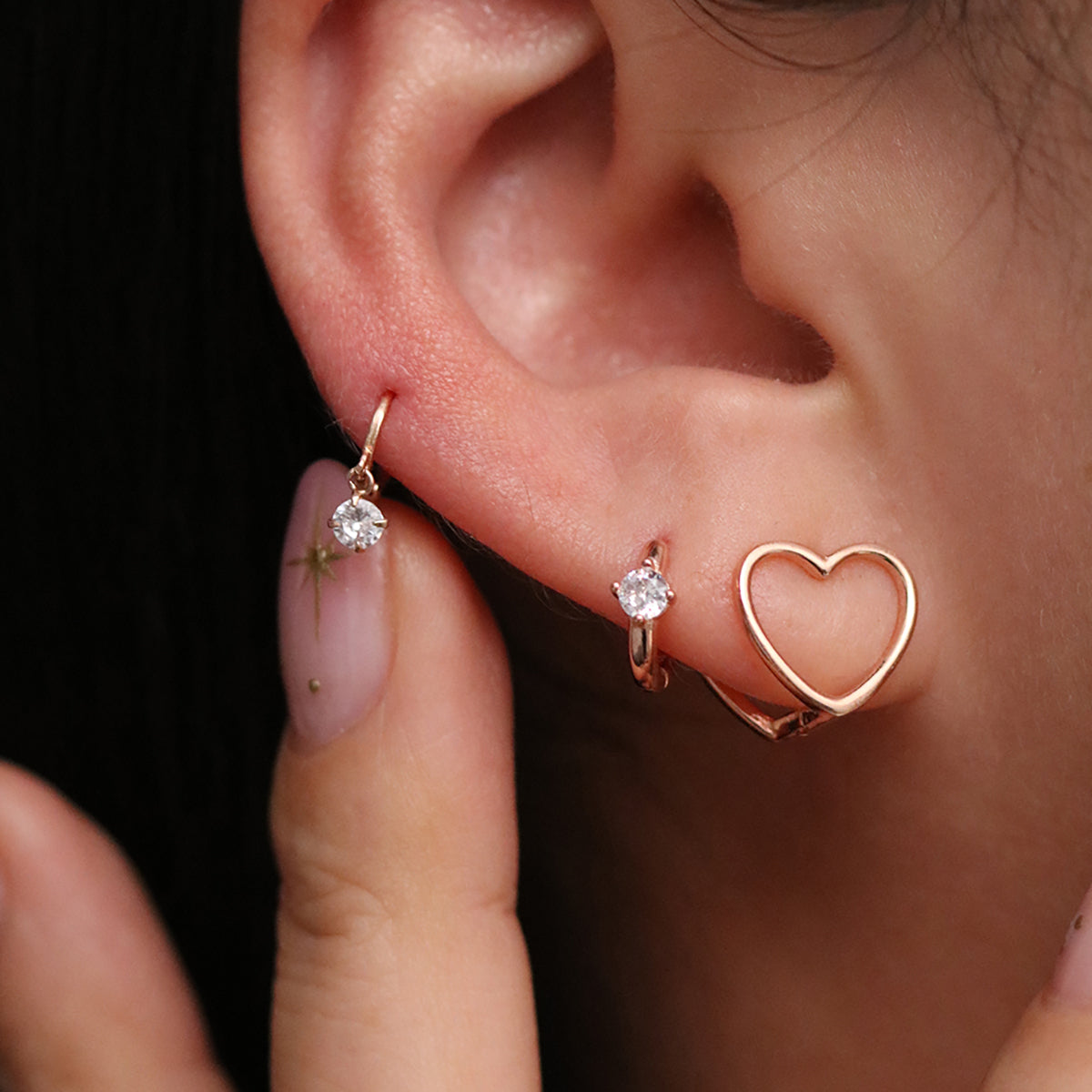 Heart silhouette huggie earrings