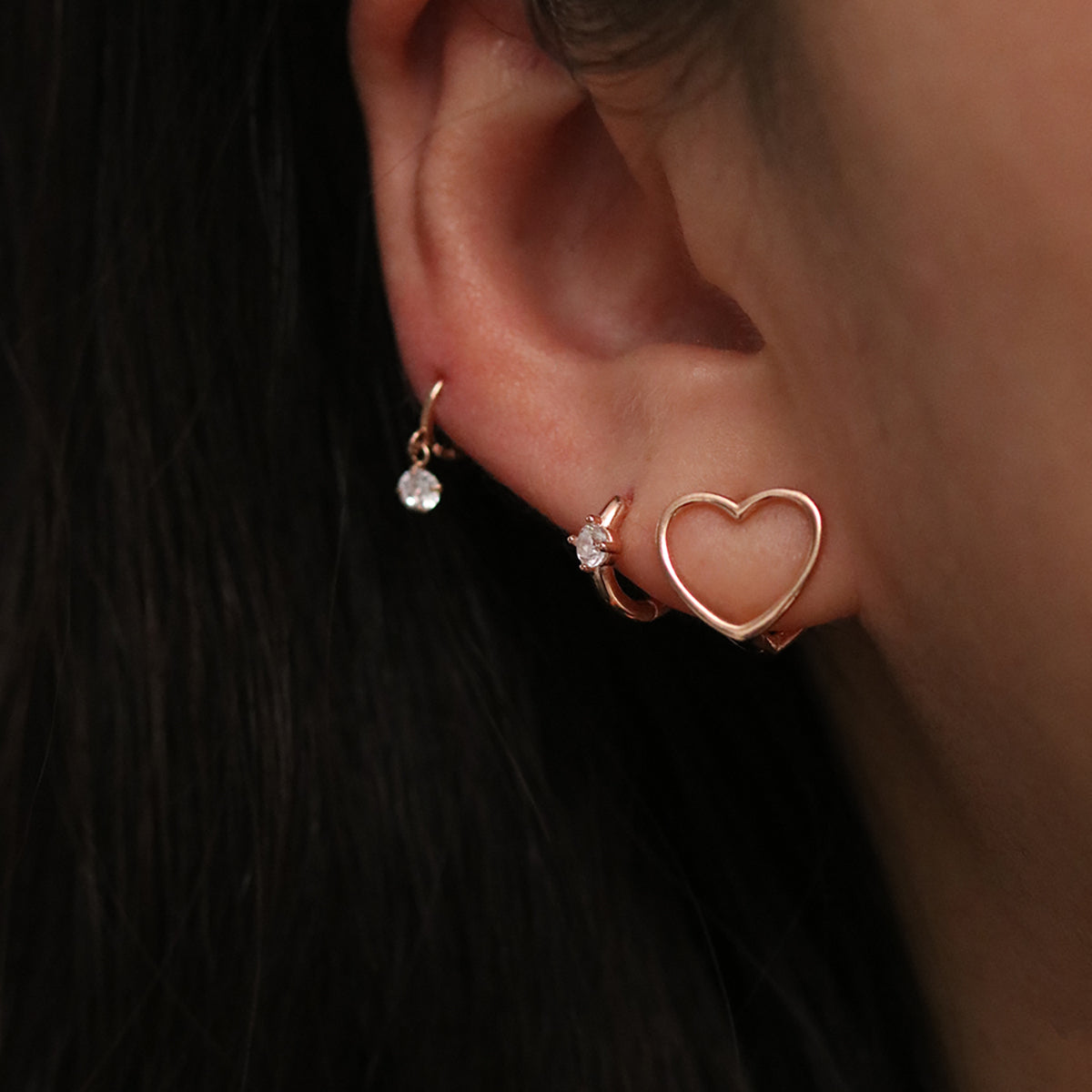 Heart silhouette huggie earrings