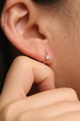Cubic twist huggie earrings
