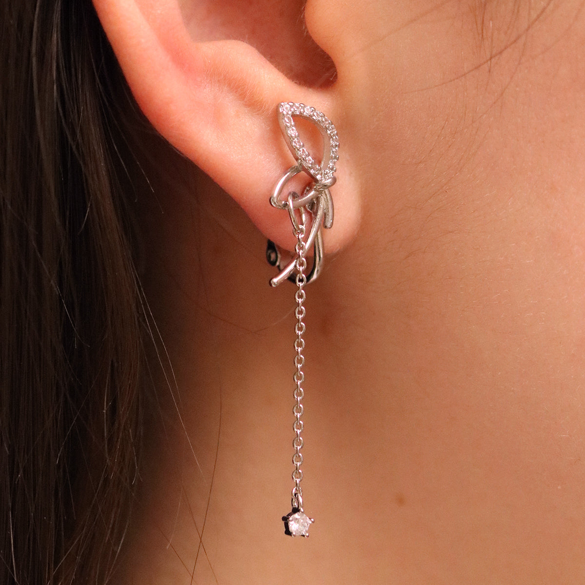 Angled knot drop clip on earrings