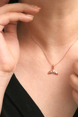 Dolphin tail necklace