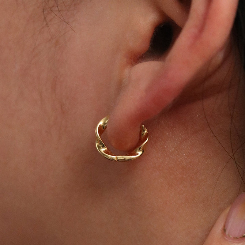 Twisted huggie earrings