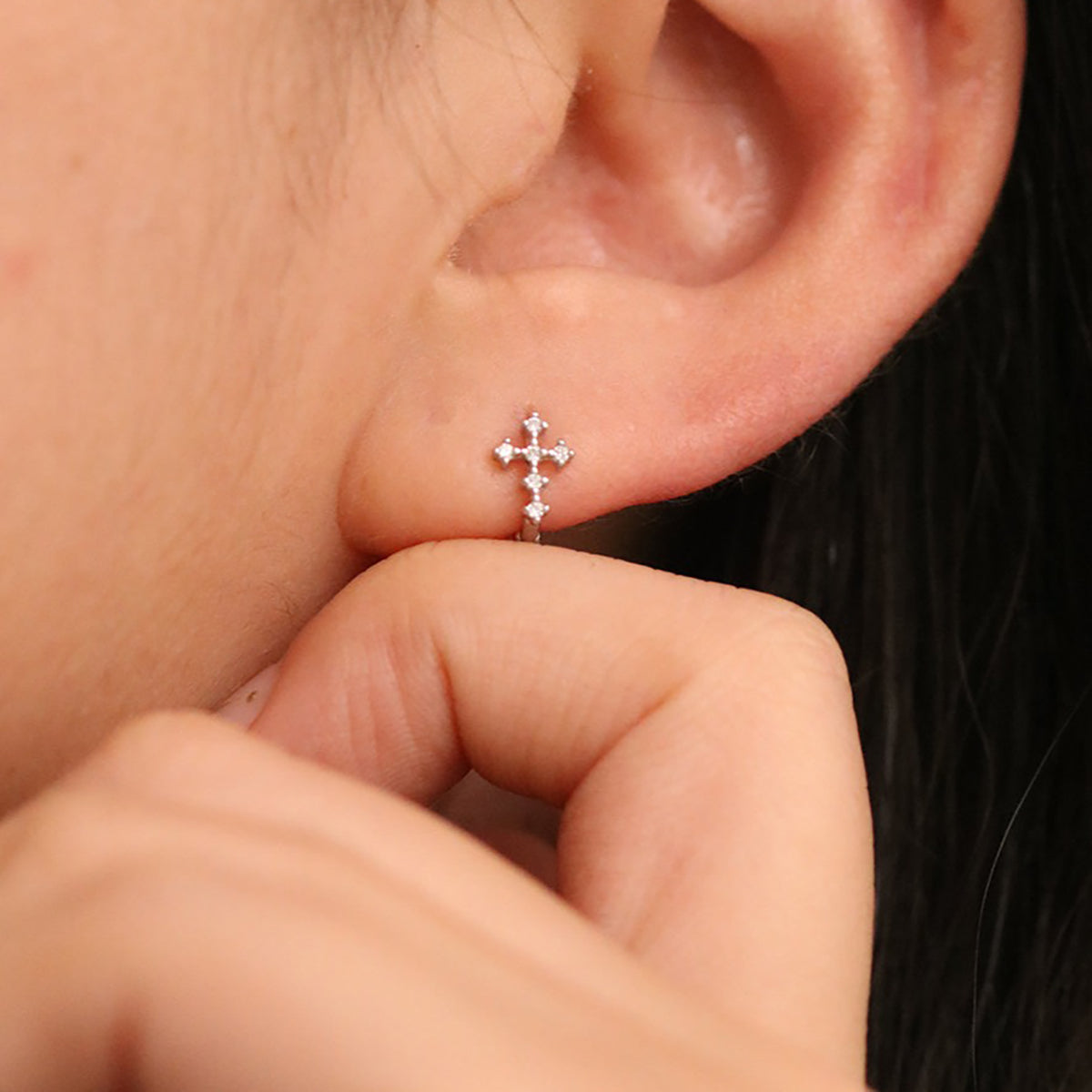 Cubic cross huggie earring