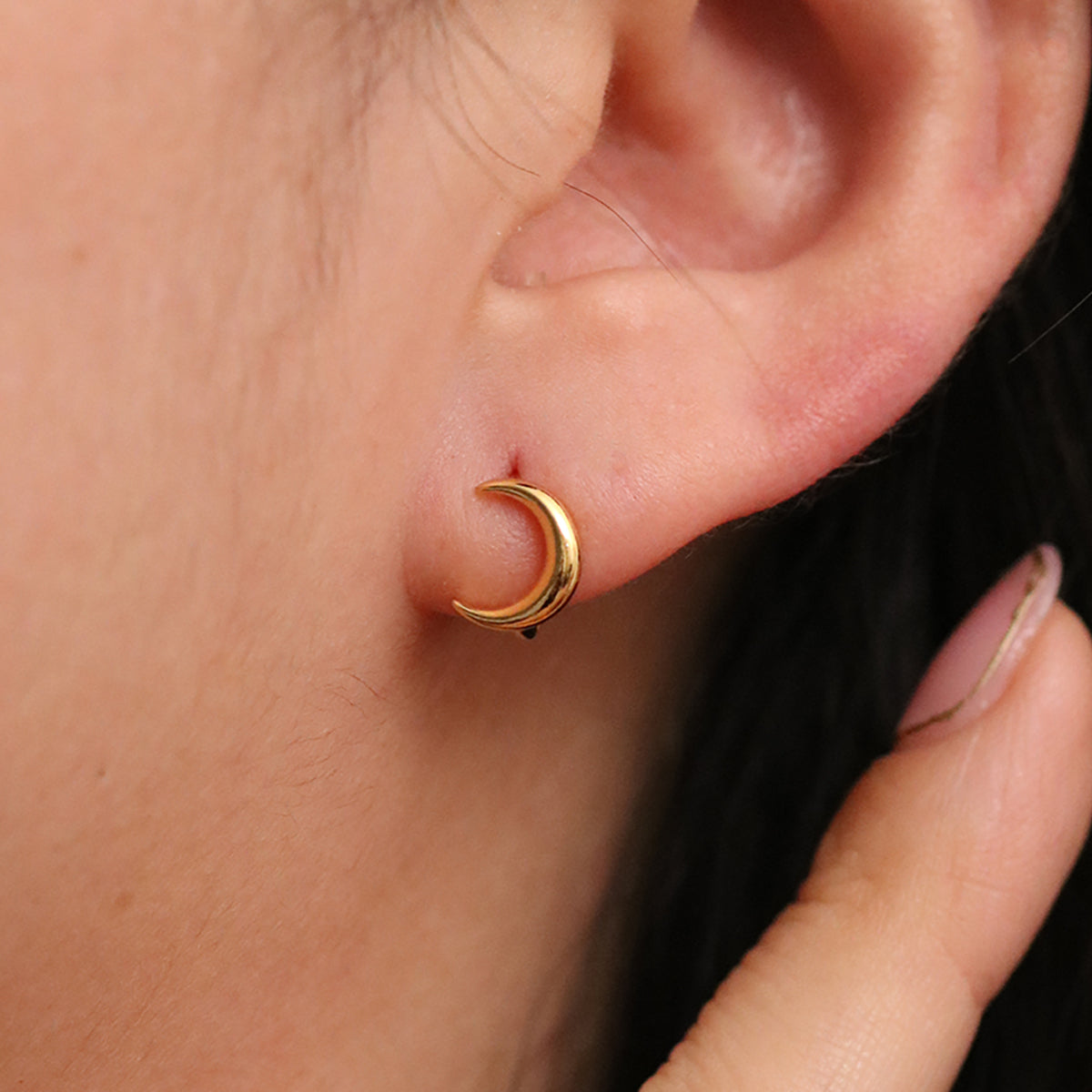 Crescent huggie earrings