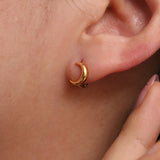 Crescent huggie earrings
