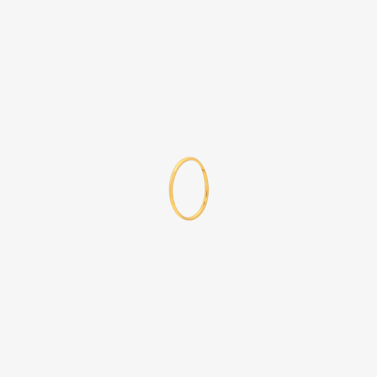 Tiny Nose Hoop featuring a sleek, minimalist design for subtle everyday elegance, offering a secure and comfortable fit for effortless, dainty style.
