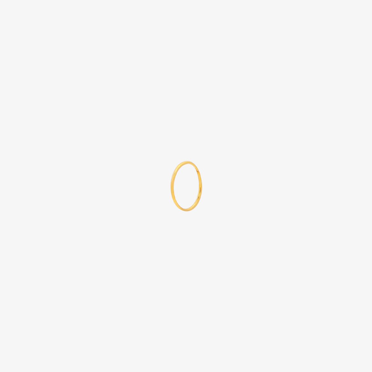 Tiny Nose Hoop featuring a sleek, minimalist design for subtle everyday elegance, offering a secure and comfortable fit for effortless, dainty style.