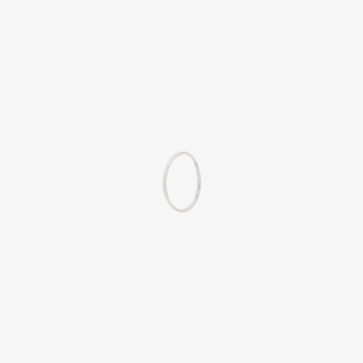 Tiny Nose Hoop featuring a sleek, minimalist design for subtle everyday elegance, offering a secure and comfortable fit for effortless, dainty style.