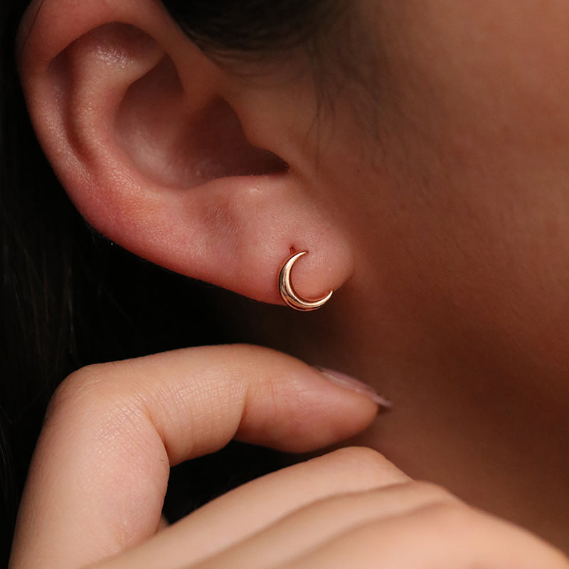 Crescent huggie earrings