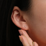 Tiny crystal moon stud earrings