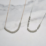 Relay pearls necklace