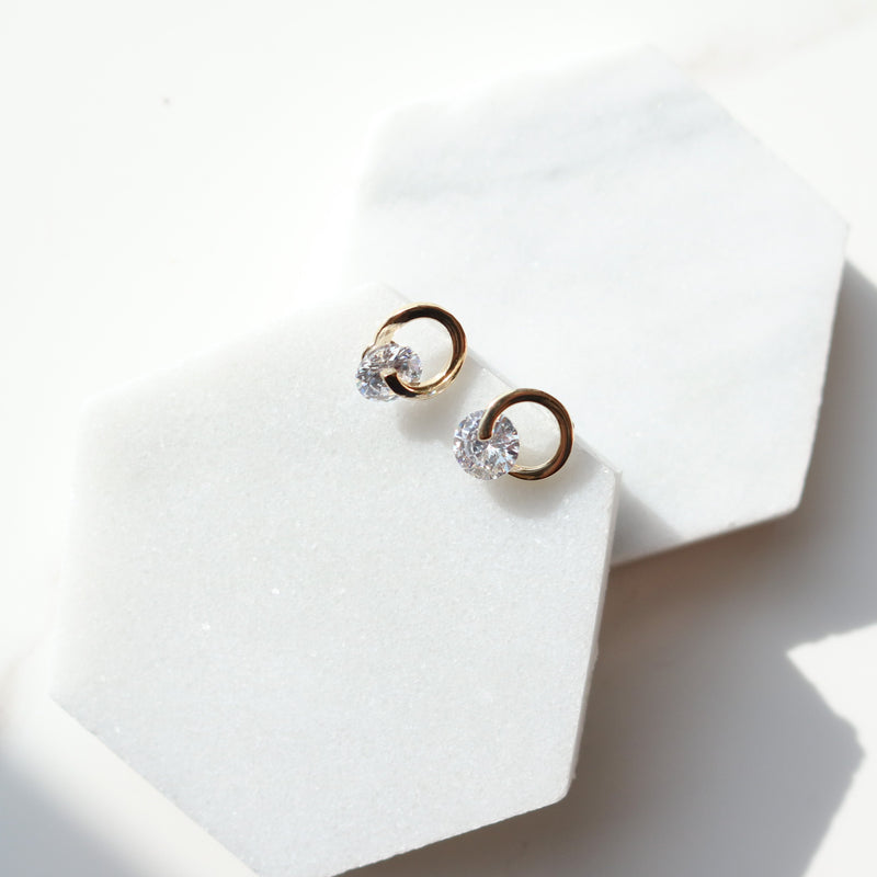 Cubic circle spins earrings