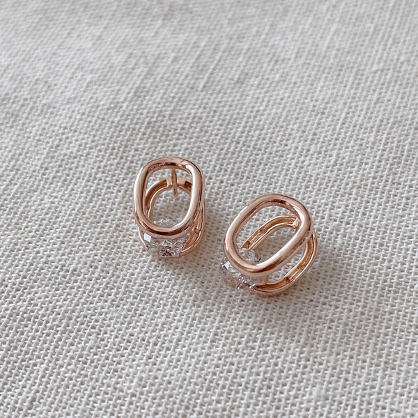 Cubic oval huggie earrings